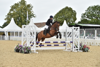 Deni Harper-Adams and Be Home by Midnight win the Retraining of Racehorses Club League 75cm Championship title